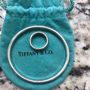 Tiffany & Co. silver bangle and ring set.